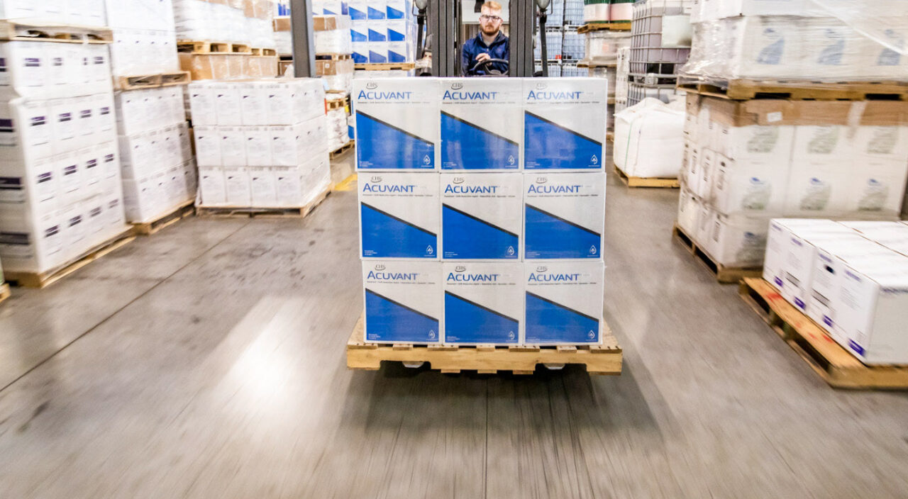 Acuvant product boxes being moved through a warehouse on a forklift